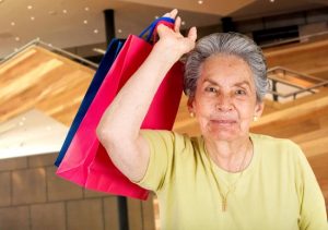 A senior shopping on Black Friday